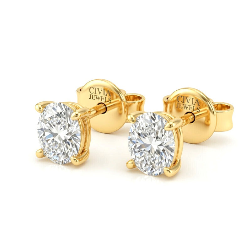 Yellow Gold Oval Cut Diamond Stud Earrings With Four Prong Setting
