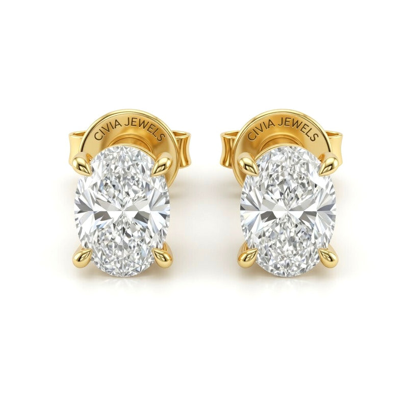 Yellow Gold Oval Cut Diamond Stud Earrings With Four Prong Setting