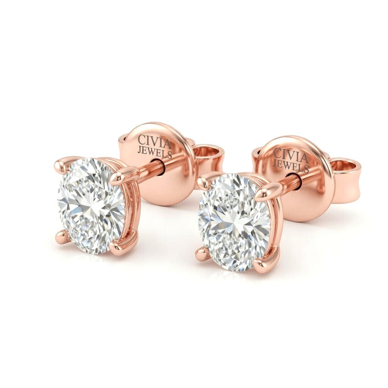 Rose Gold Oval Cut Diamond Stud Earrings With Four Prong Setting