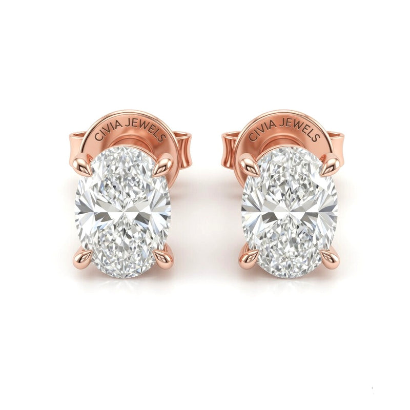 Rose Gold Oval Cut Diamond Stud Earrings With Four Prong Setting