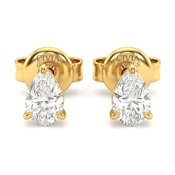 Yellow Gold Pear Cut Diamond Stud Earrings With Four Prong Setting