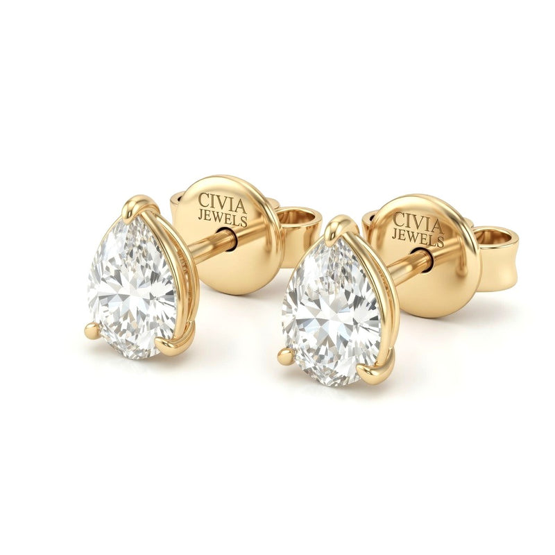 Yellow Gold Pear Cut Diamond Stud Earrings With Four Prong Setting