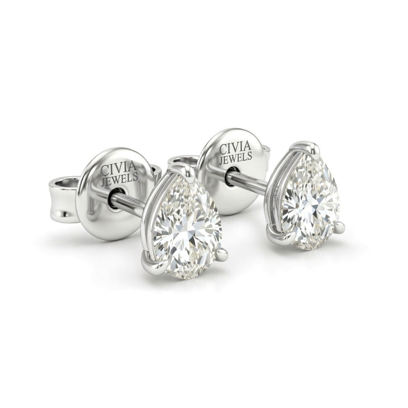 White Gold Pear Cut Diamond Stud Earrings With Four Prong Setting