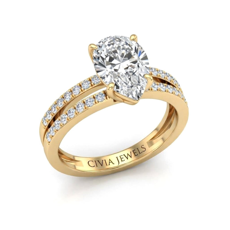 Yellow Gold Pear Cut Double Row Pavé Split Band Engagement Ring With Classic Four Prong Solitaire Setting