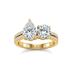 Yellow Gold Pear & Round Diamond Modern Two Stone Ring With Side Diamonds