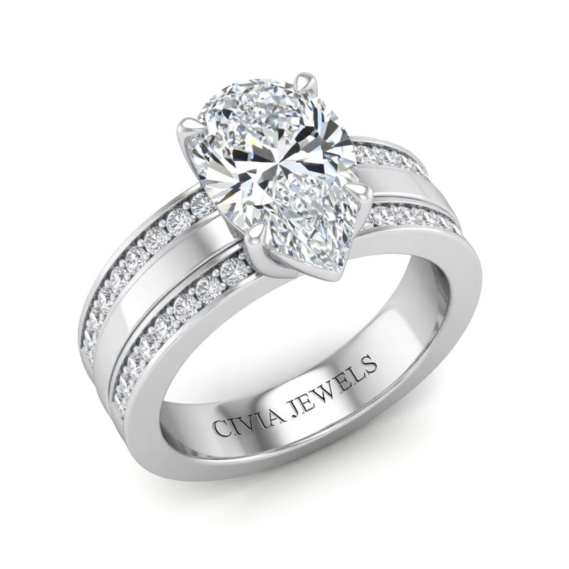 Silver Pear Diamond Multirow Engagement Ring With Four Prong Setting And Pavé Side Bands