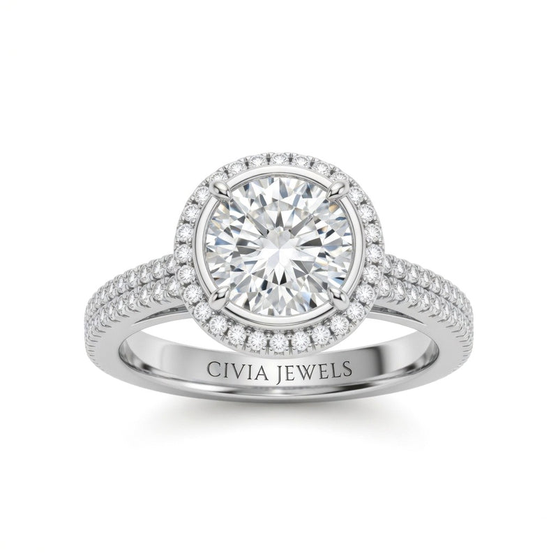 White Gold Round Cut Diamond Halo Engagement Ring With Four Prong Setting And Pavé Band