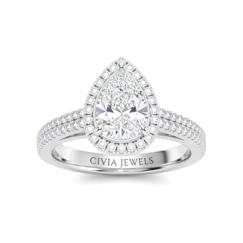 Silver Pear Cut Diamond Halo Engagement Ring With Four Prong Setting And Pavé Band