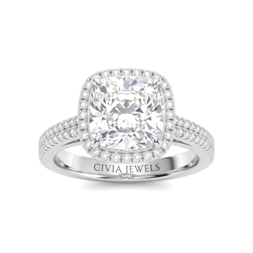 White Gold Cushion Cut Diamond Halo Engagement Ring With Four Prong Setting And Pavé Band