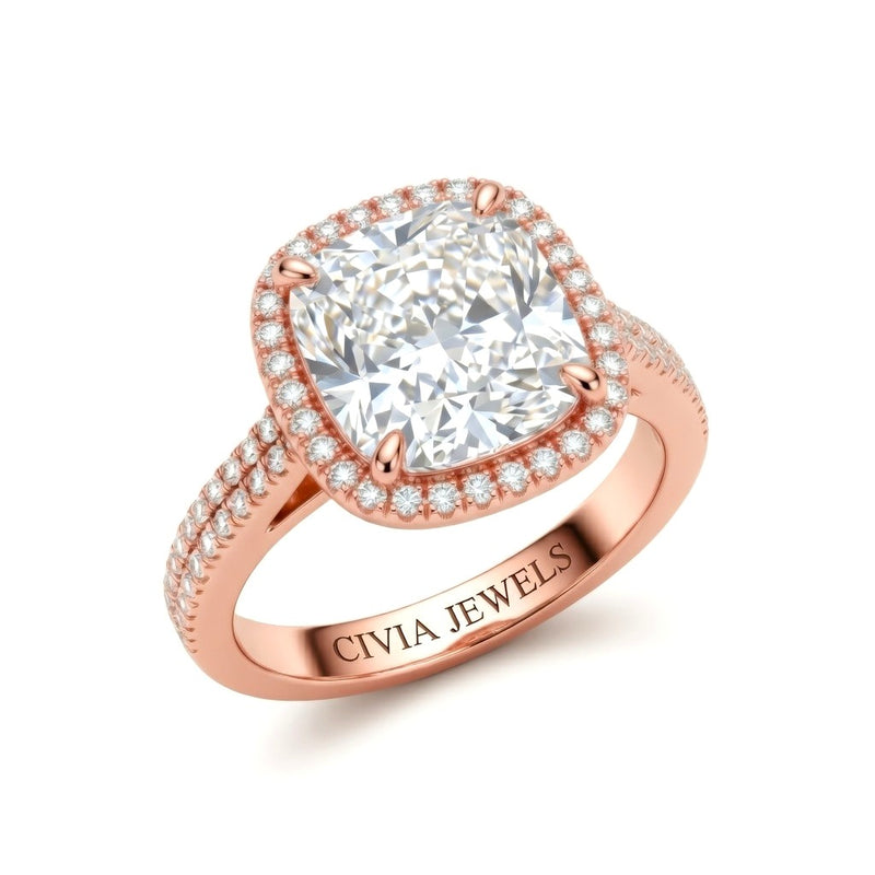 Rose Gold Cushion Cut Diamond Halo Engagement Ring With Four Prong Setting And Pavé Band