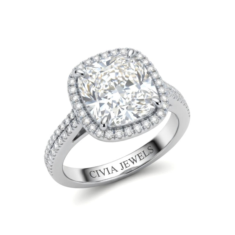 Silver Cushion Cut Diamond Halo Engagement Ring With Four Prong Setting And Pavé Band