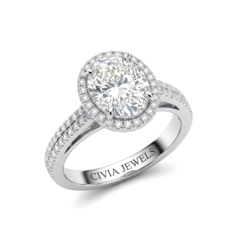 White Gold Oval Cut Diamond Halo Engagement Ring With Four Prong Setting And Pavé Band