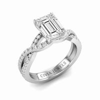 White Gold Emerald Diamond Engagement Ring With Twisted Pavé Band And Four Prong Solitaire Setting