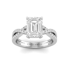 White Gold Emerald Diamond Engagement Ring With Twisted Pavé Band And Four Prong Solitaire Setting