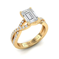 Yellow Gold Emerald Diamond Engagement Ring With Twisted Pavé Band And Four Prong Solitaire Setting