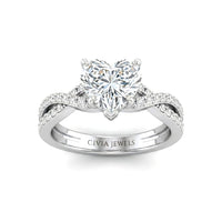 White Gold Heart Diamond Engagement Ring With Twisted Pavé Band And Four Prong Solitaire Setting