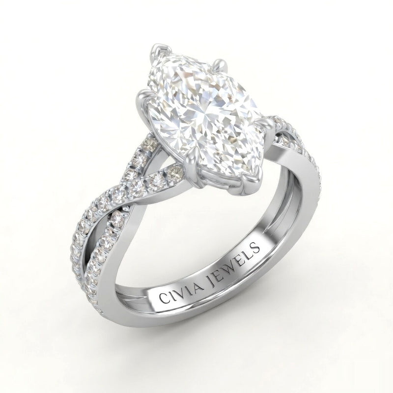 White Gold Marquise Diamond Engagement Ring With Twisted Pavé Band And Four Prong Solitaire Setting