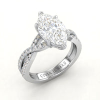 White Gold Marquise Diamond Engagement Ring With Twisted Pavé Band And Four Prong Solitaire Setting