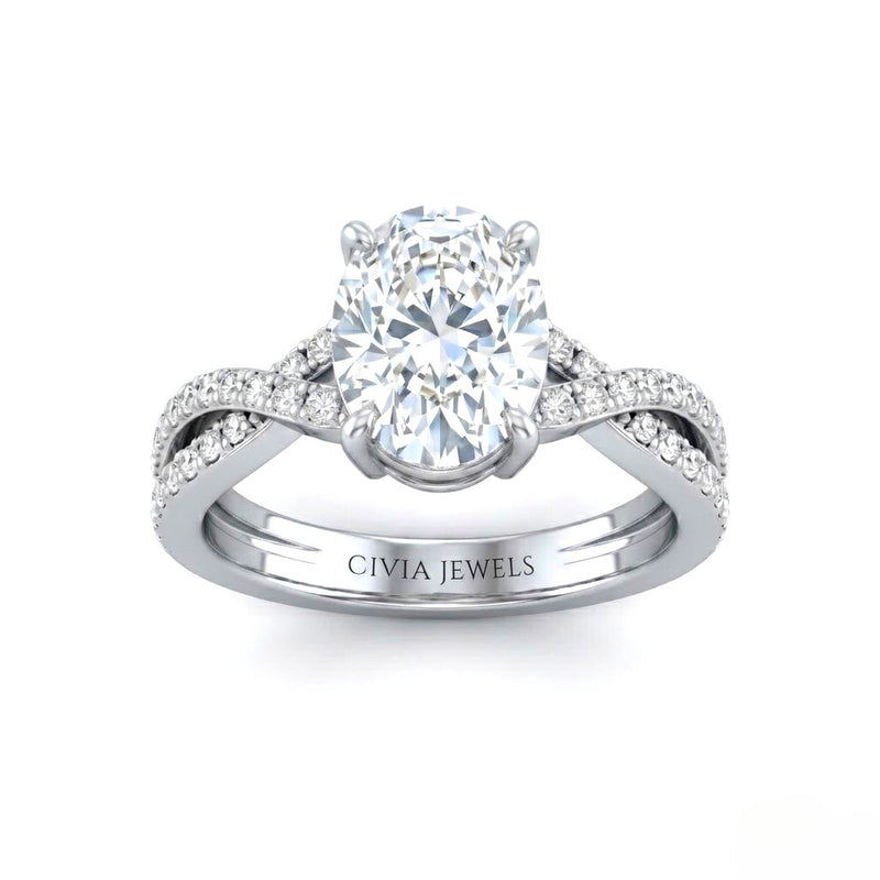 White Gold Oval Diamond Engagement Ring With Twisted Pavé Band And Four Prong Solitaire Setting
