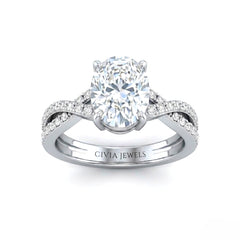White Gold Oval Diamond Engagement Ring With Twisted Pavé Band And Four Prong Solitaire Setting