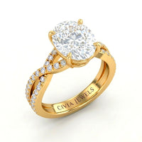 Yellow Gold Oval Diamond Engagement Ring With Twisted Pavé Band And Four Prong Solitaire Setting