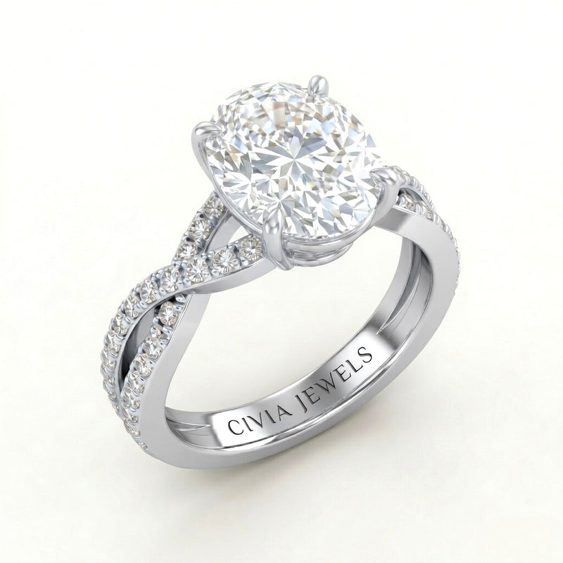 White Gold Oval Diamond Engagement Ring With Twisted Pavé Band And Four Prong Solitaire Setting