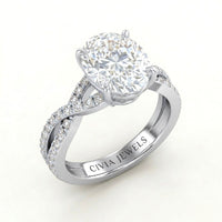 White Gold Oval Diamond Engagement Ring With Twisted Pavé Band And Four Prong Solitaire Setting