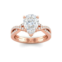 Rose Gold Pear Diamond Engagement Ring With Twisted Pavé Band And Four Prong Solitaire Setting