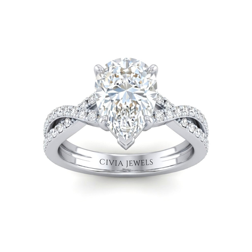 White Gold Pear Diamond Engagement Ring With Twisted Pavé Band And Four Prong Solitaire Setting