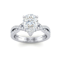 White Gold Pear Diamond Engagement Ring With Twisted Pavé Band And Four Prong Solitaire Setting
