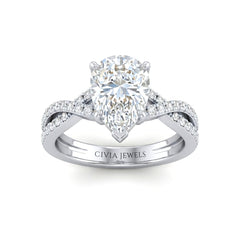 White Gold Pear Diamond Engagement Ring With Twisted Pavé Band And Four Prong Solitaire Setting