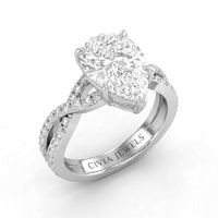 Silver Pear Diamond Engagement Ring With Twisted Pavé Band And Four Prong Solitaire Setting