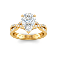 Yellow Gold Pear Diamond Engagement Ring With Twisted Pavé Band And Four Prong Solitaire Setting