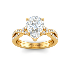 Yellow Gold Pear Diamond Engagement Ring With Twisted Pavé Band And Four Prong Solitaire Setting