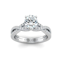 White Gold Round Diamond Engagement Ring With Twisted Pavé Band And Four Prong Solitaire Setting
