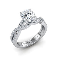 White Gold Round Diamond Engagement Ring With Twisted Pavé Band And Four Prong Solitaire Setting
