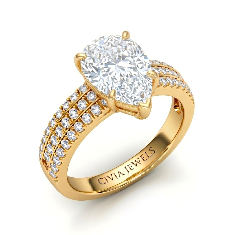 Yellow Gold Pear Diamond Engagement Ring With Triple Pavé Band