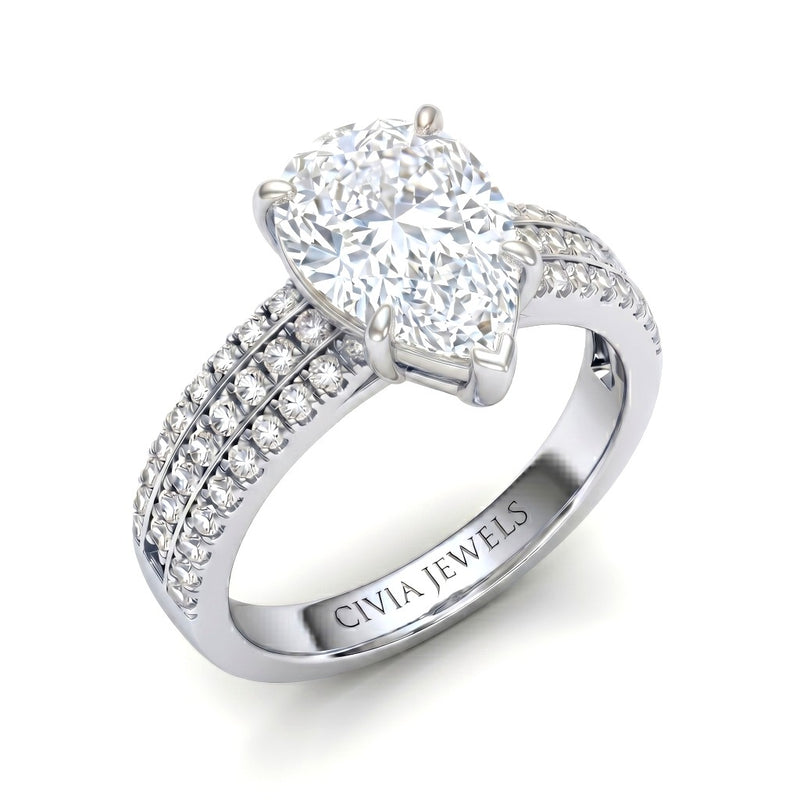 White Gold Pear Diamond Engagement Ring With Triple Pavé Band
