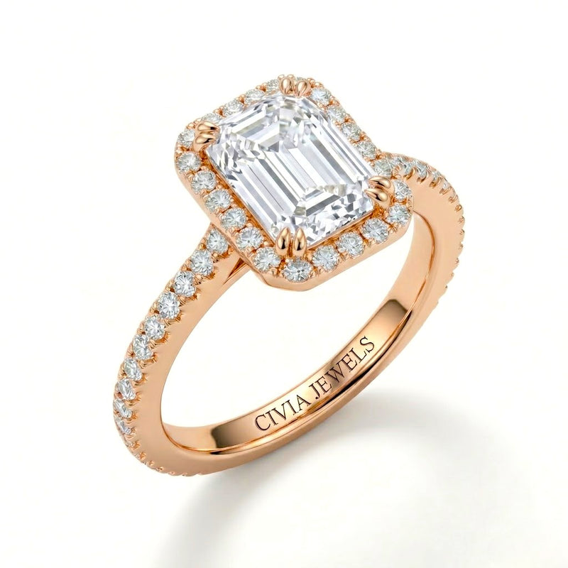 Rose Gold Emerald Diamond Halo Engagement Ring With Pavé Band Design