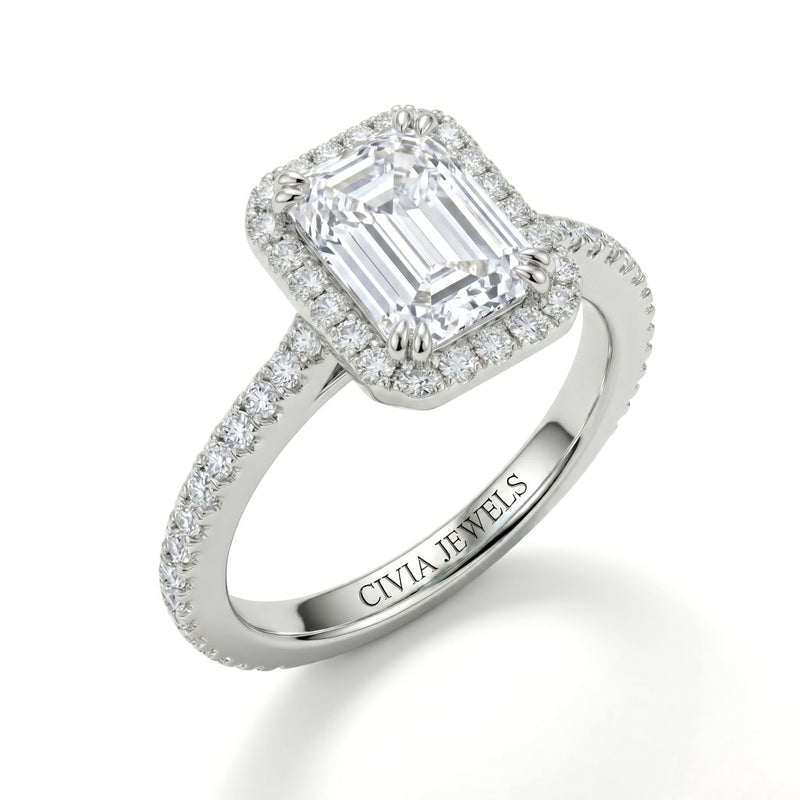White Gold Emerald Diamond Halo Engagement Ring With Pavé Band Design