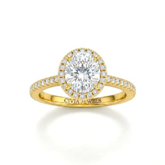 Yellow Gold Oval Diamond Halo Engagement Ring With Pavé Band Design