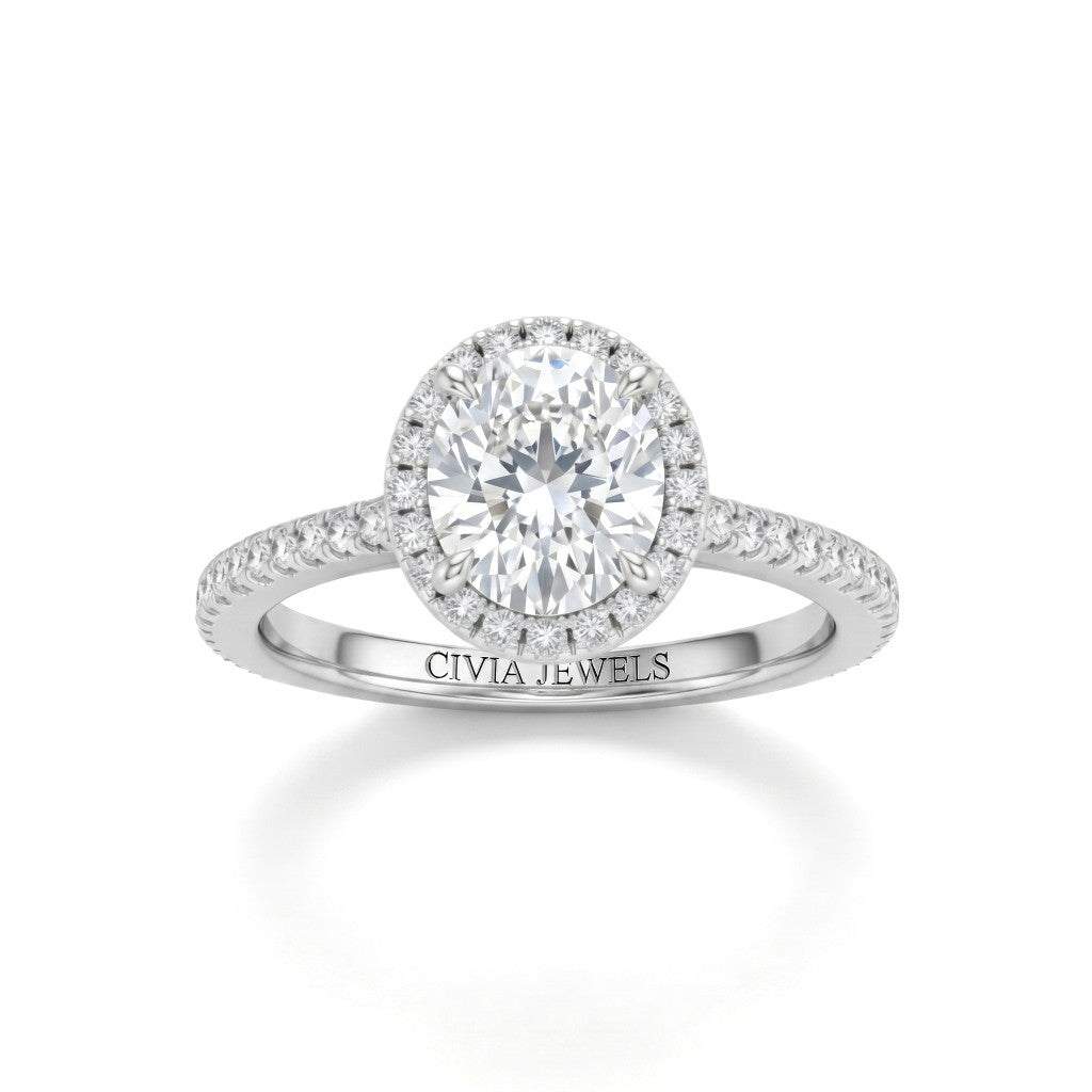 White Gold Oval Diamond Halo Engagement Ring With Pavé Band Design