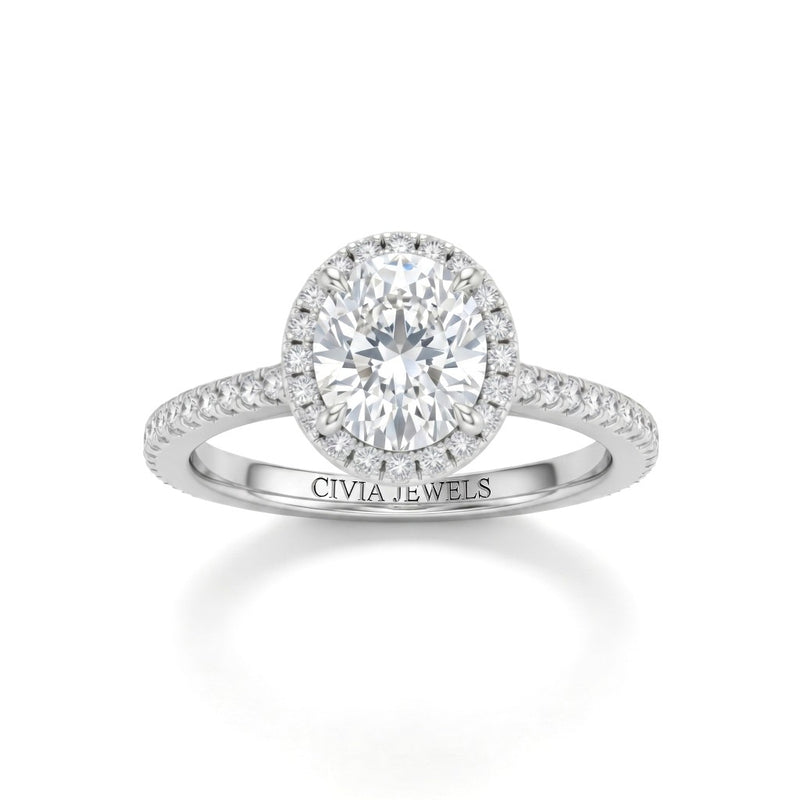 Silver Oval Diamond Halo Engagement Ring With Pavé Band Design