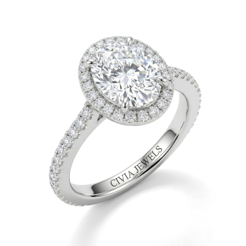 Silver Oval Diamond Halo Engagement Ring With Pavé Band Design