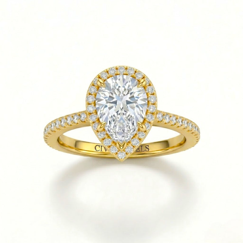 Yellow Gold Pear Diamond Halo Engagement Ring With Pavé Band Design