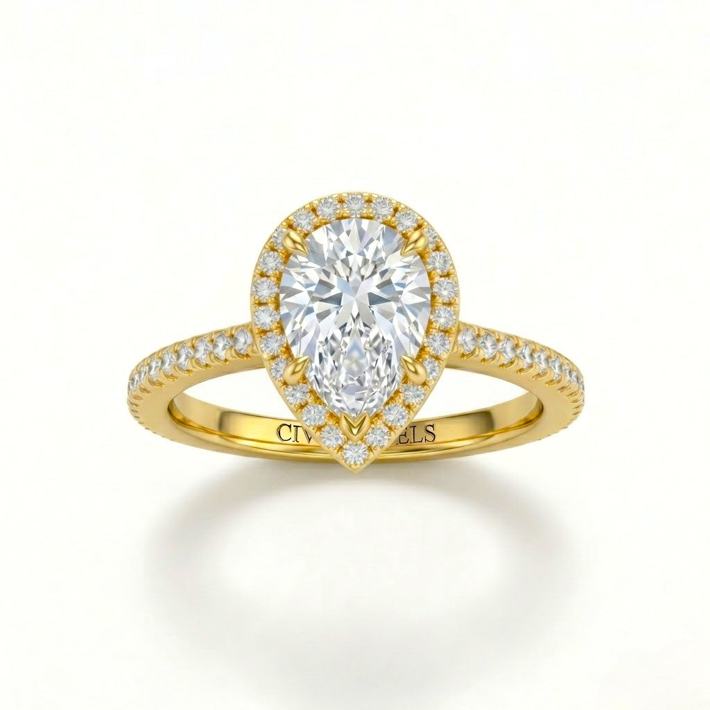 Yellow Gold Pear Diamond Halo Engagement Ring With Pavé Band Design