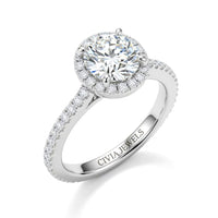 Silver Round Diamond Halo Engagement Ring With Pavé Band Design