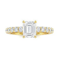 Yellow Gold Emerald Diamond Engagement Ring With Pavé Band Design