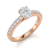 Rose Gold Oval Diamond Engagement Ring With Pavé Band Design