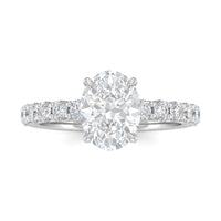 White Gold Oval Diamond Engagement Ring With Pavé Band Design